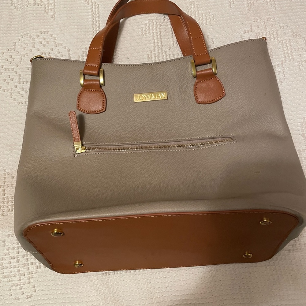 Joy and Iman in synthetic large tote